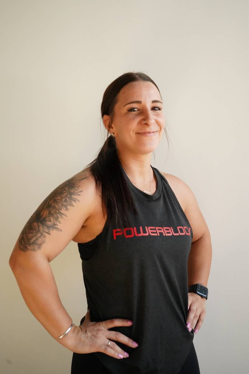 powerblock fitness studio coach Amanda Laux smiling for a headshot photo.